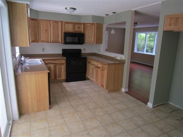 57 North Plain Road Sunderland, MA 01375 - Photo 6 of 13 a kitchen with a refrigerator stove and a sink