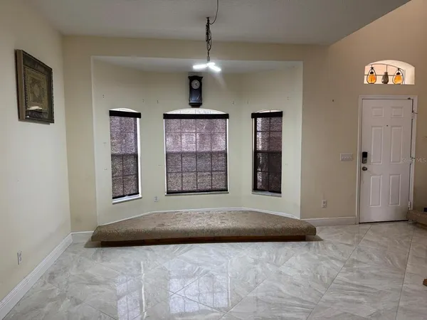 a view of livingroom with hardwood floor and window