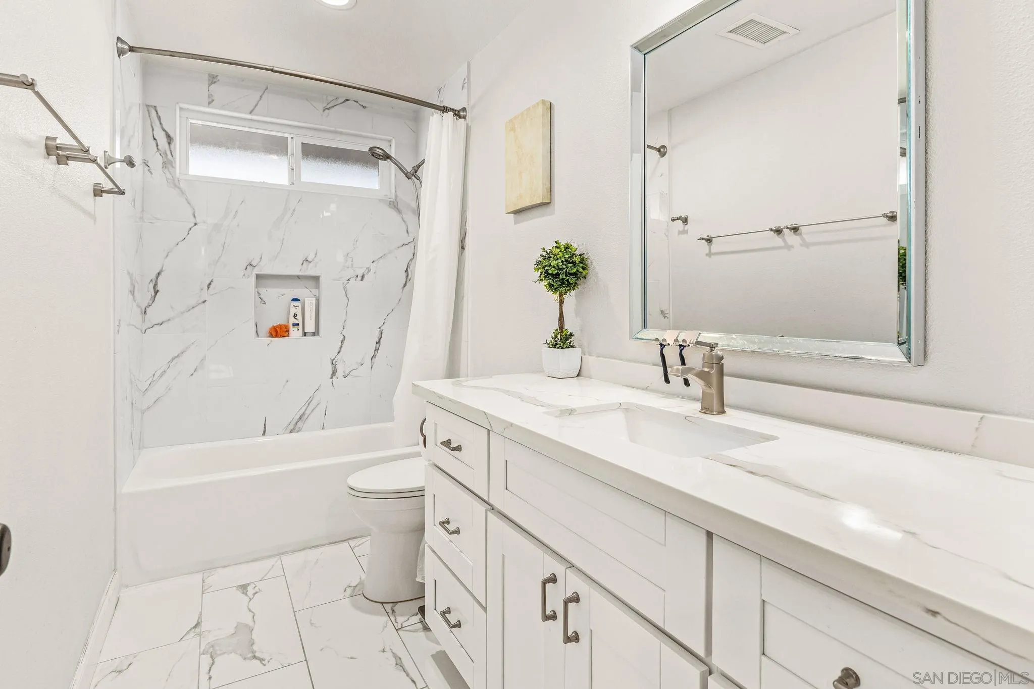 10831 Ironwood Road Scripps Ranch, CA 92131 - Photo 19 of 25 a bathroom with a granite countertop sink toilet and shower