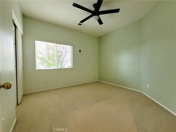 en empty room with windows