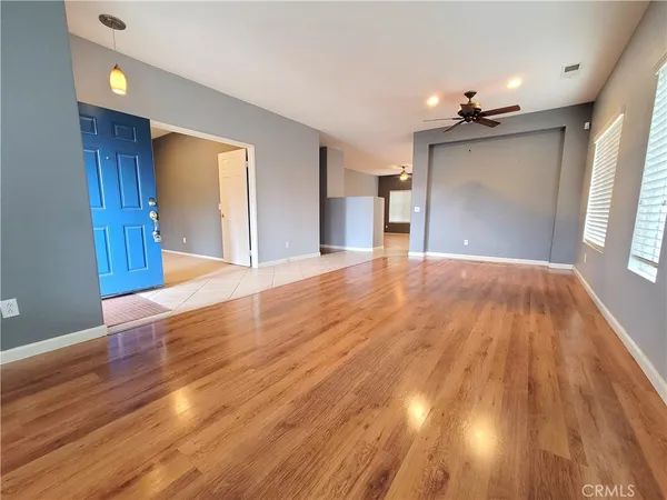 a view of a livingroom with wooden floor