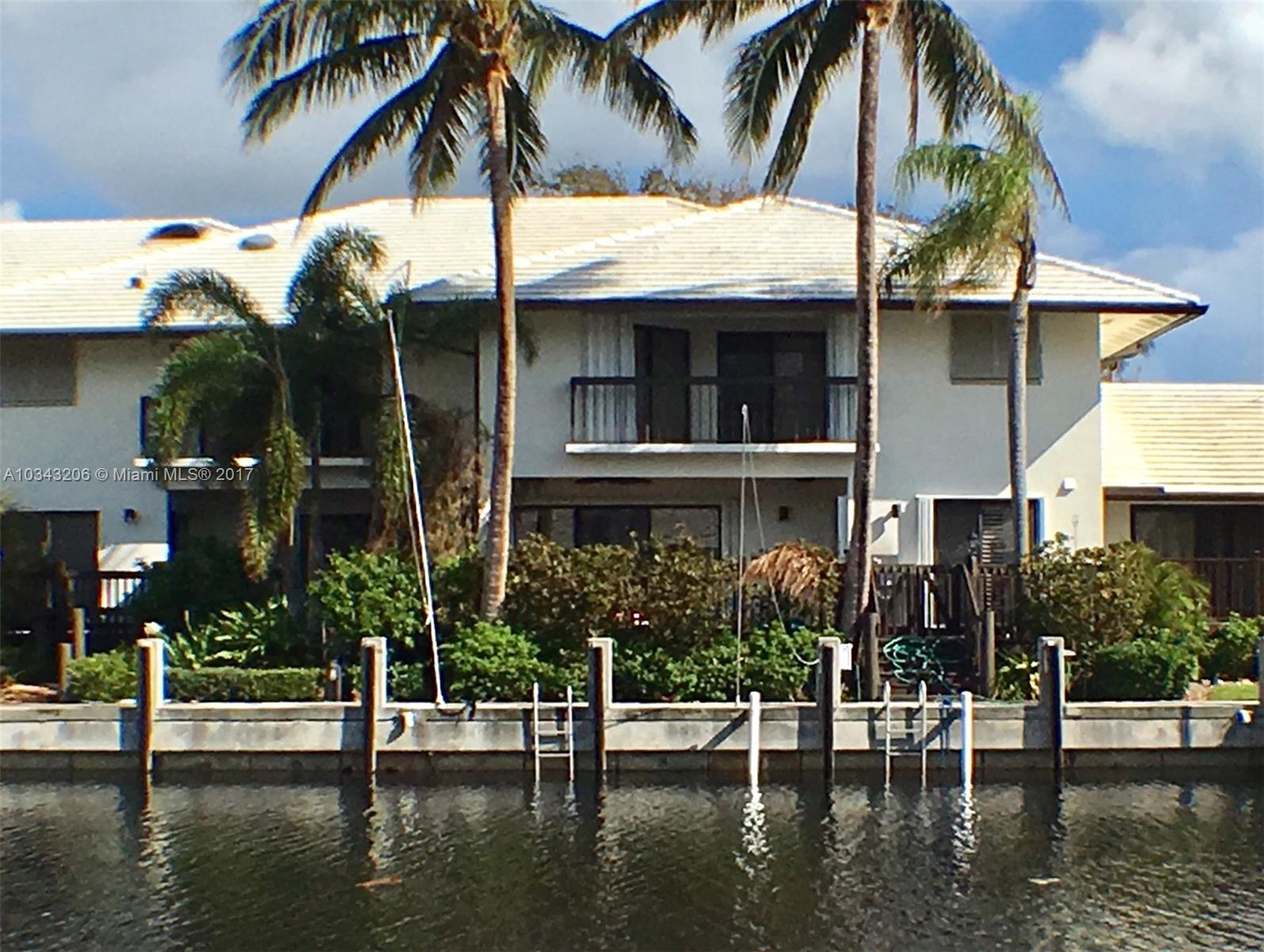 608 Boca Marina Court, Unit 608 Boca Raton, FL 33487 - Photo 2 of 20 BACK VIEW OF TOWNHOUSE FACING SOUTH.