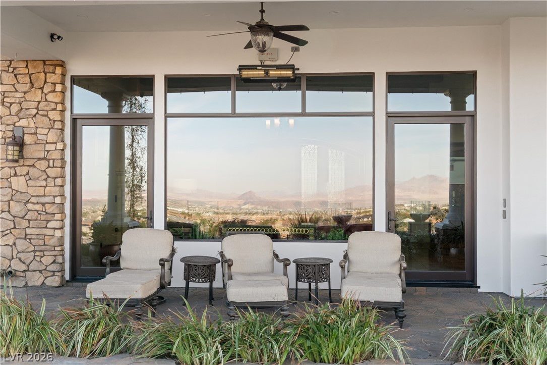 1123 Christian Road Henderson, NV 89002 - Photo 61 of 94 An inviting outdoor patio with panoramic views of the distant mountain landscape.