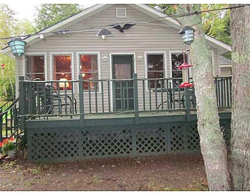 236 Davis Road Alexander, ME 04694 - Photo 5 of 24 Exterior Front. Deck is just feet...