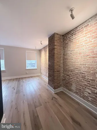 a view of a hallway view with staircase