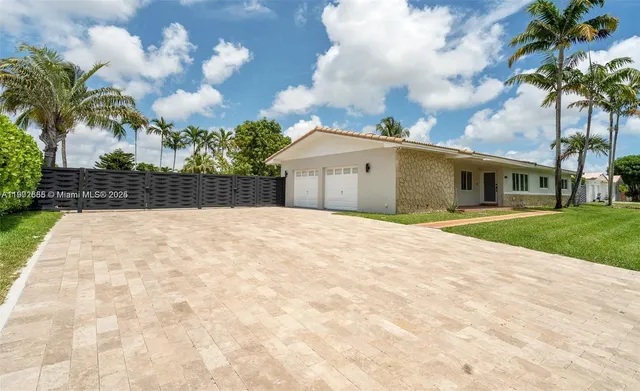 a view of front of house with a yard