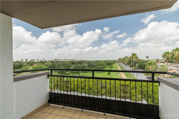 a view of a lake from a balcony