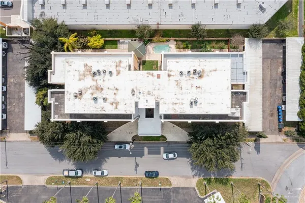 an aerial view of a house with outdoor space