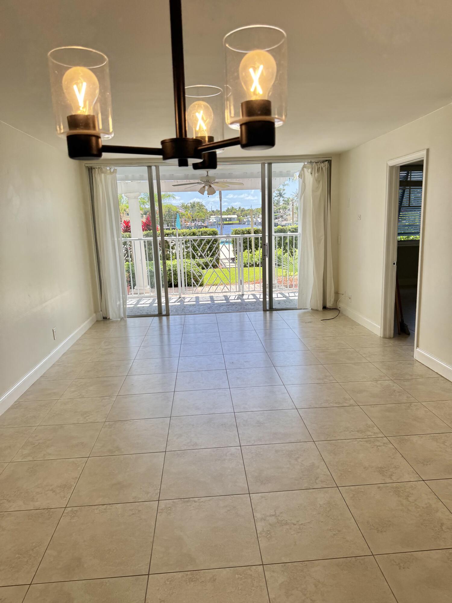 651 East Woolbright Road, Unit 103 Boynton Beach, FL 33435 - Photo 5 of 26 IMG_4772