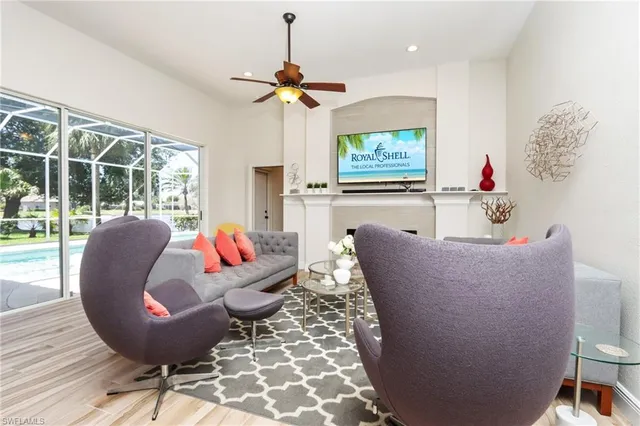 a living room with furniture and a window