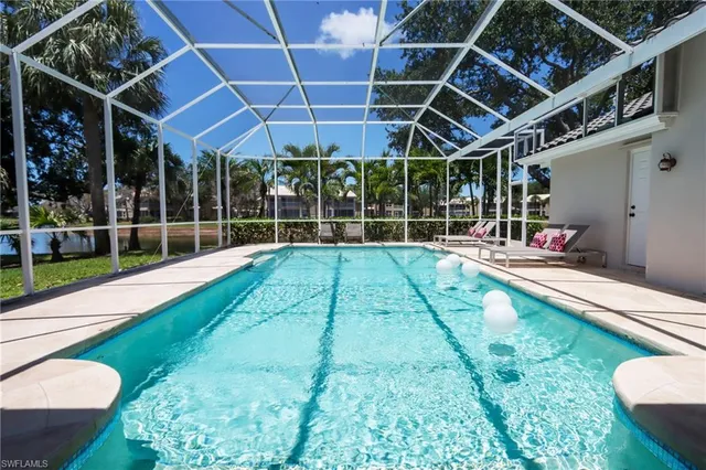 a view of swimming pool with a patio