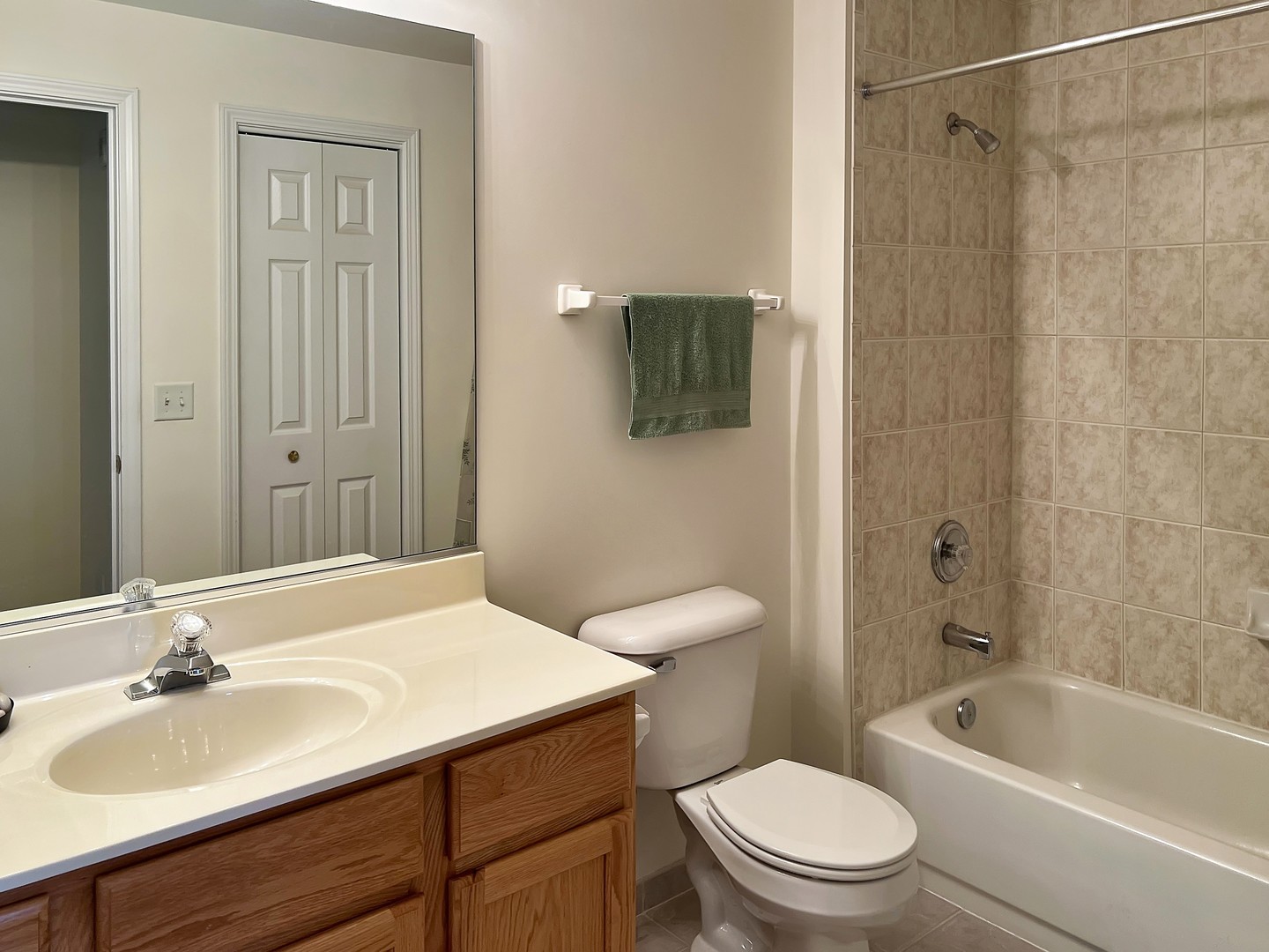 3451 North Carriageway Drive, Unit 503 Arlington Heights, IL 60004 - Photo 16 of 22 a bathroom with a sink a toilet and shower