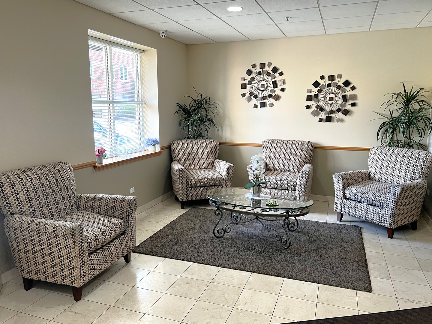 3451 North Carriageway Drive, Unit 503 Arlington Heights, IL 60004 - Photo 20 of 22 a living room with furniture and a large window