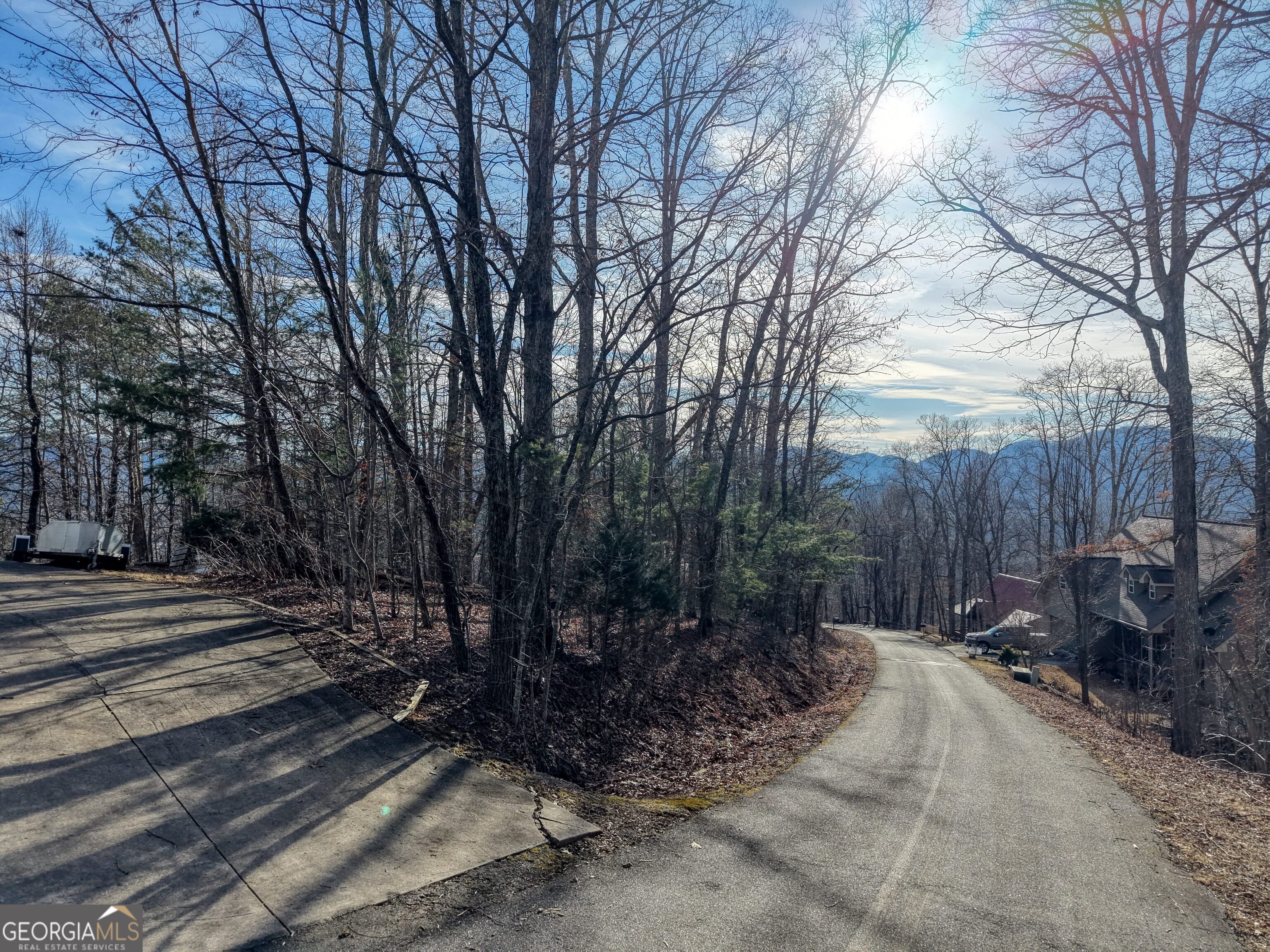 Lot 5 Harris Ridge Young Harris, GA 30582 - Photo 5 of 15 a view of a backyard with trees