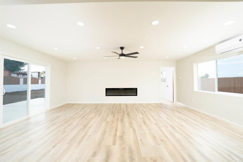 1314 Bluegrass Road Vista, CA 92083 - Photo 8 of 16 a view of empty room with wooden floor