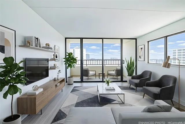 a living room with furniture and a large window