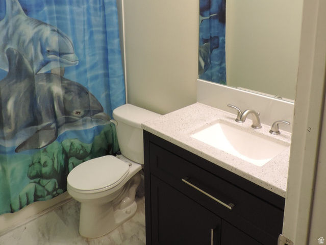 8198 North Cedar Springs Road, Unit 5 Eagle Mountain, UT 84005 - Photo 18 of 30 2nd Bathroom with vanity, shower / bath combo, and light marble finish floors