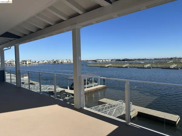 a view of a balcony with city view