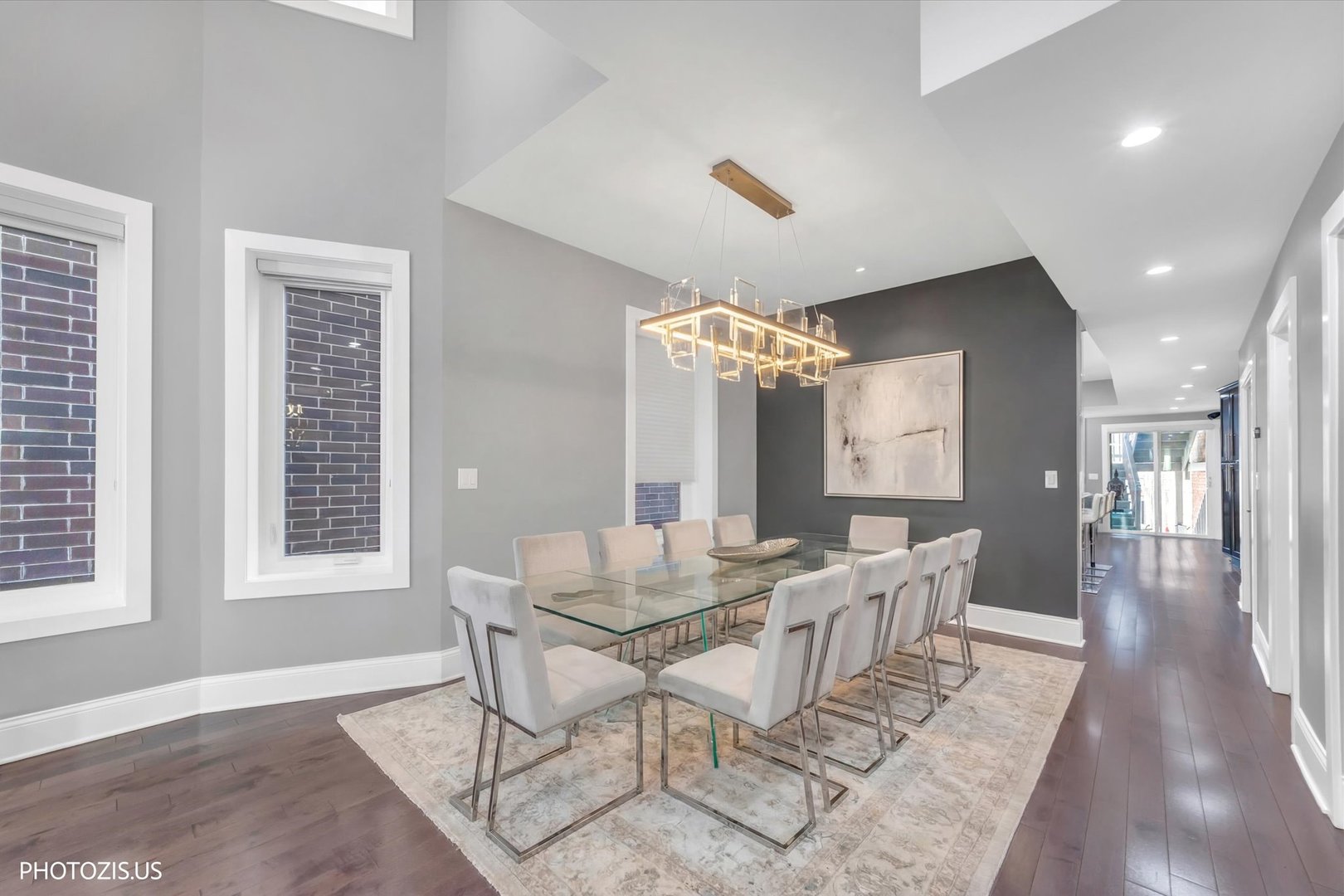 461 West Melrose Street Chicago, IL 60657 - Photo 12 of 83 a dining room with furniture a chandelier and wooden floor