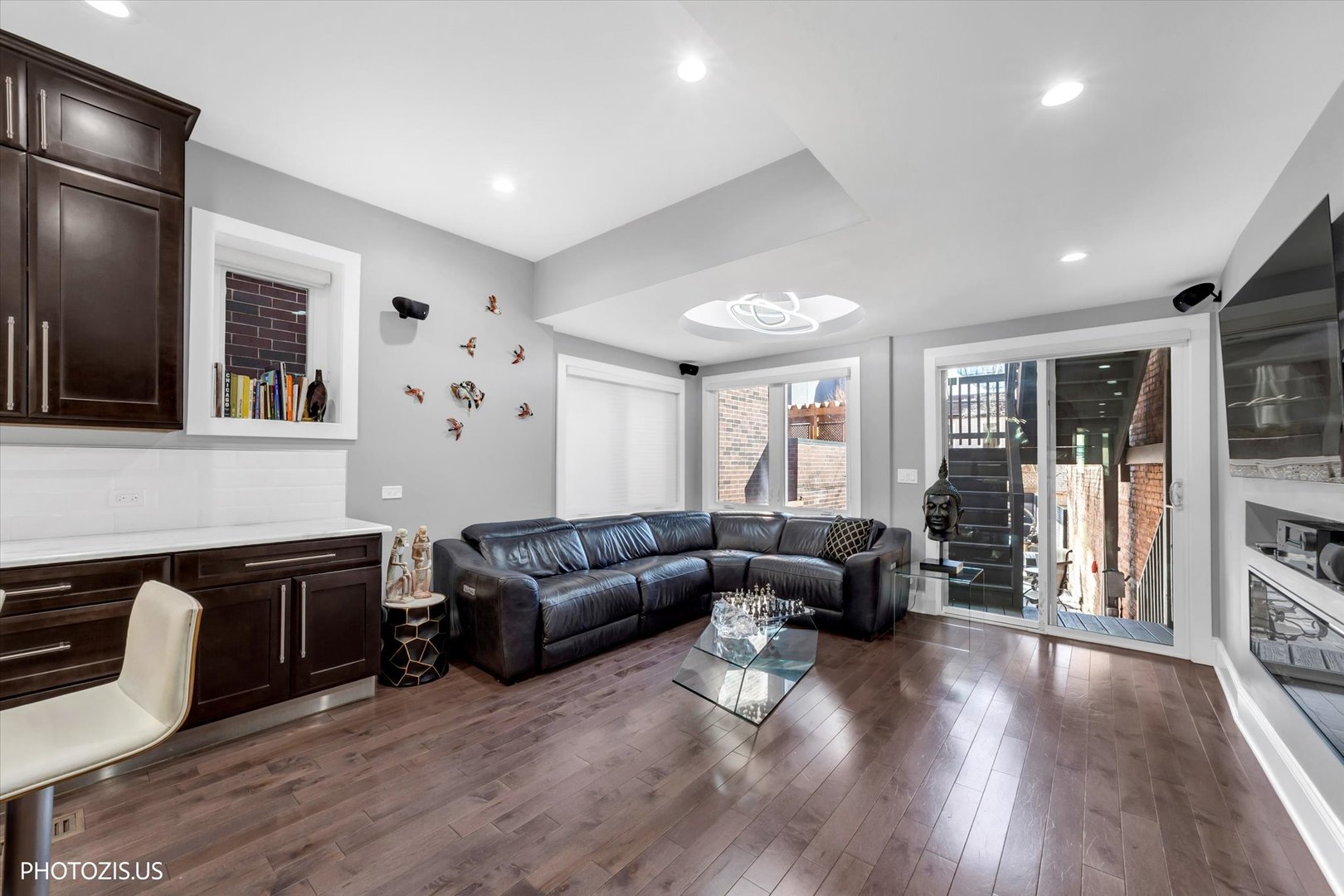 461 West Melrose Street Chicago, IL 60657 - Photo 26 of 83 a living room with furniture window and wooden floor