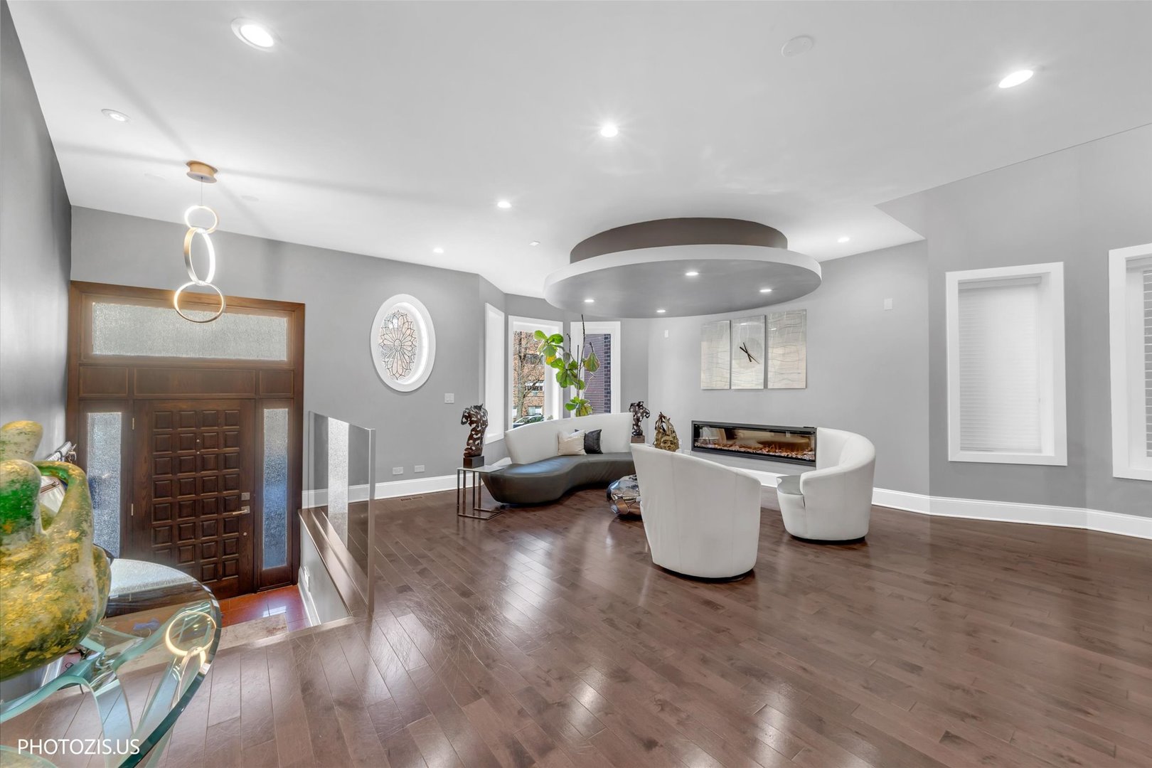 461 West Melrose Street Chicago, IL 60657 - Photo 3 of 83 an open kitchen with a table and chairs