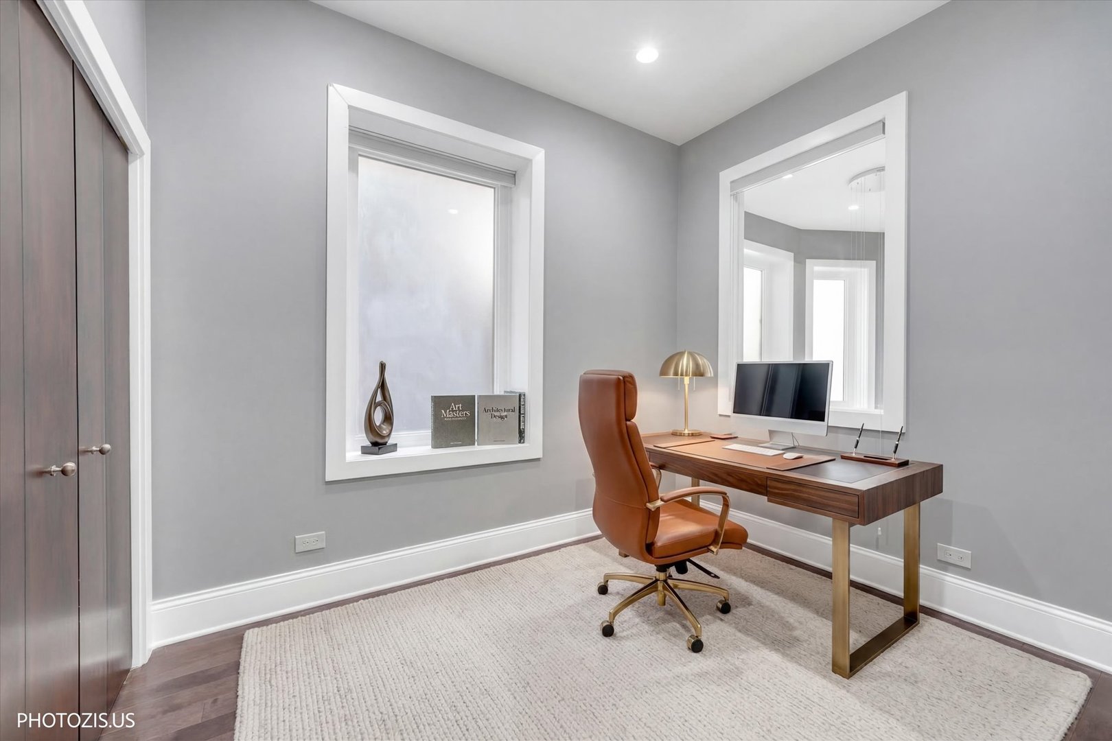 461 West Melrose Street Chicago, IL 60657 - Photo 37 of 83 a view of a workspace with furniture and a window