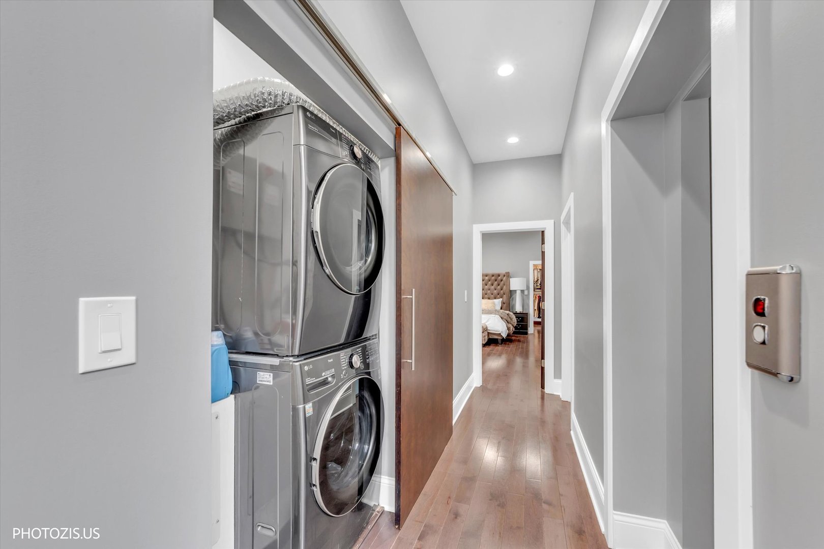 461 West Melrose Street Chicago, IL 60657 - Photo 48 of 83 a view of a hallway with washer and dryer
