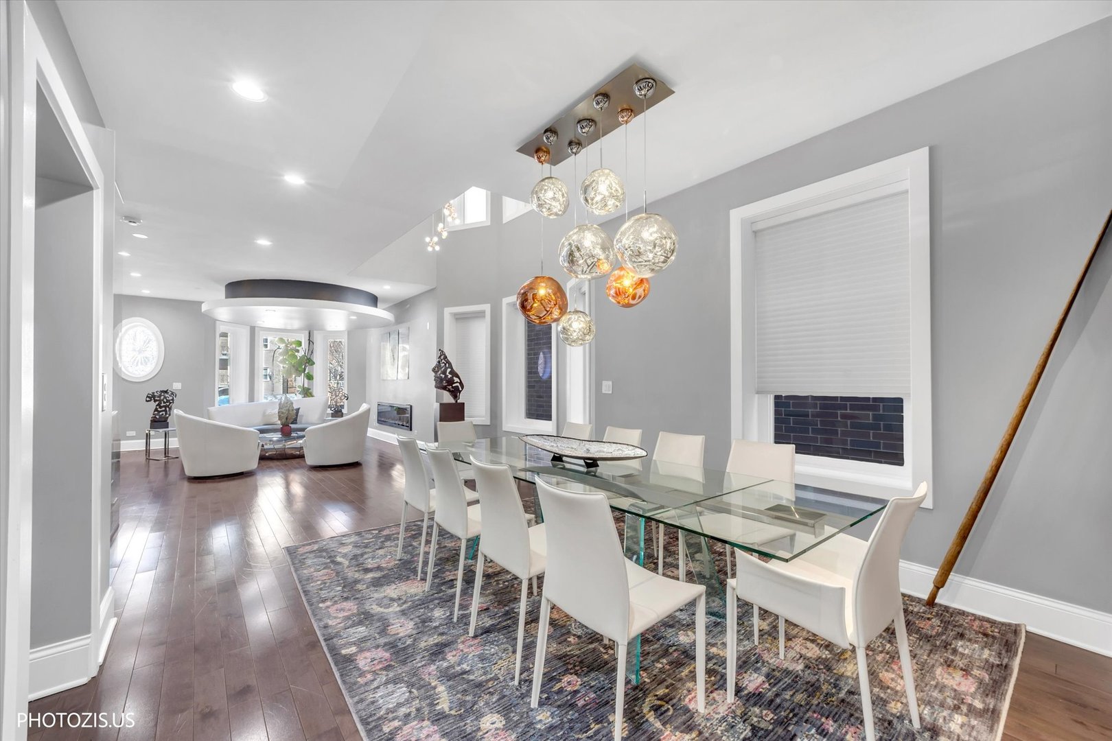 461 West Melrose Street Chicago, IL 60657 - Photo 10 of 83 a view of a dining room with furniture and wooden floor