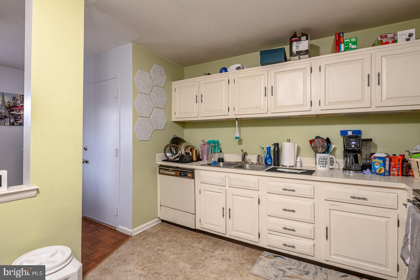 16B Fairway Road Reading, PA 19607 - Photo 6 of 14 a kitchen with white cabinets and sink