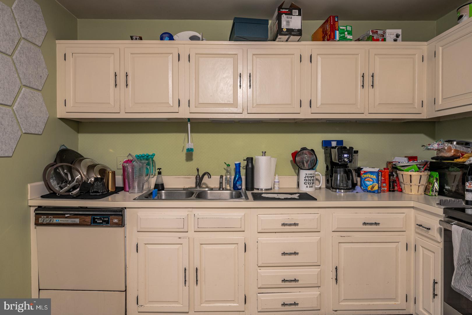 16B Fairway Road Reading, PA 19607 - Photo 7 of 14 a kitchen with white cabinets and appliances