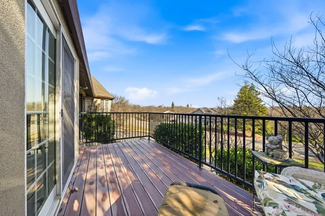 a spacious bathroom with a granite countertop tub sink shower and mirror