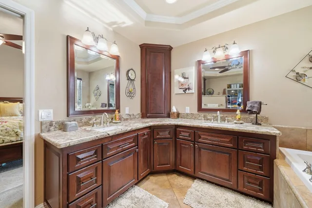 a bathroom with a bathtub and a sink