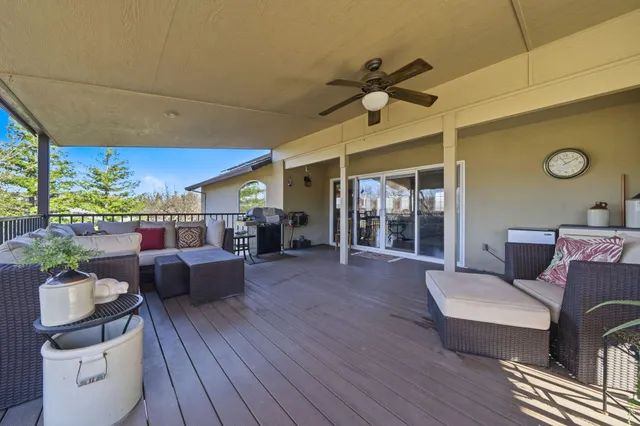 a view of a backyard with a patio
