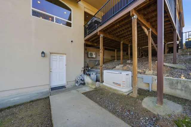 an aerial view of residential house with outdoor space