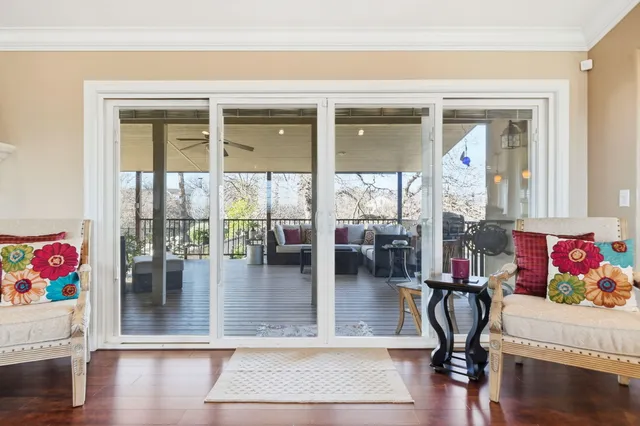 a view of a living room and dining room