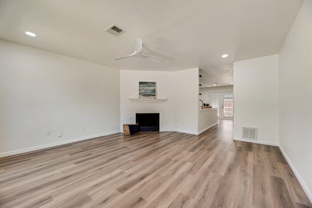 190 Merlin Way Euless, TX 76039 - Photo 2 of 39 2026 Newly installed LTV flooring throughout all spaces.