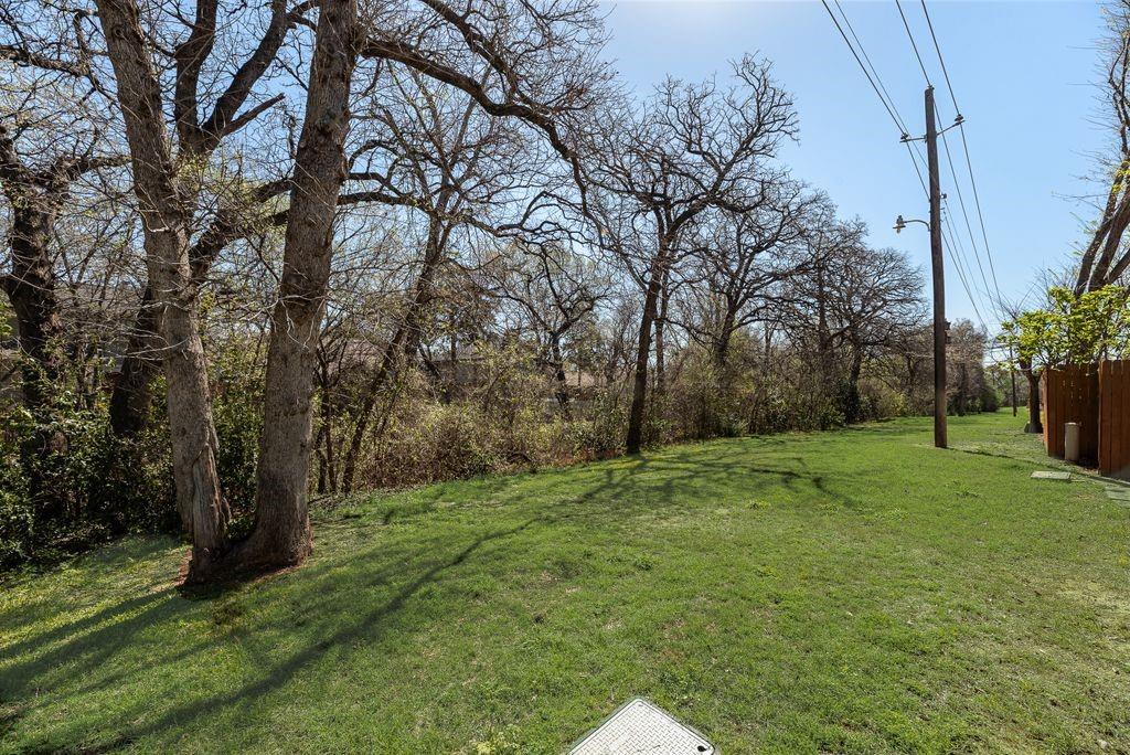 190 Merlin Way Euless, TX 76039 - Photo 21 of 39 Outside gate is grass area that leads to Bob Eden Park walking trails. You will pass the community pool on your way.