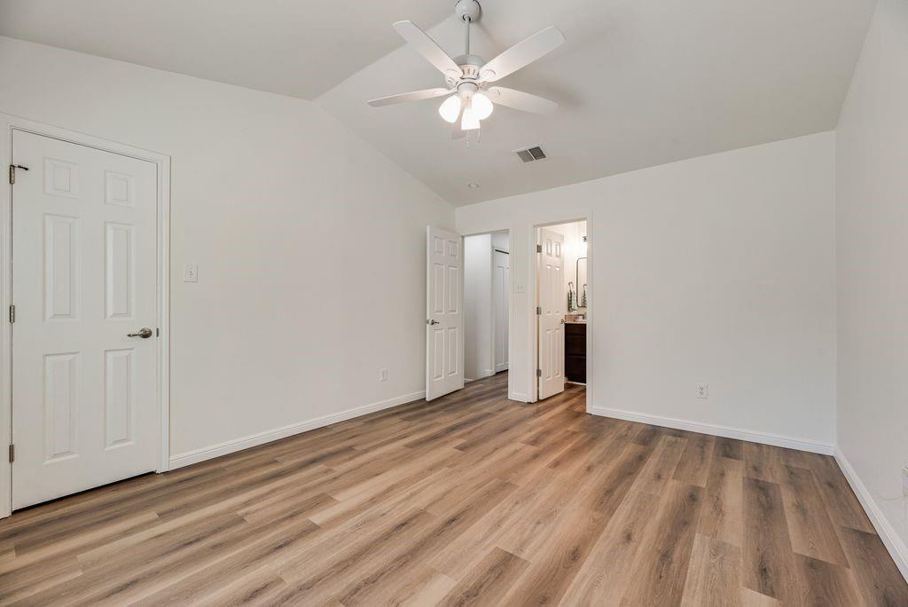 190 Merlin Way Euless, TX 76039 - Photo 26 of 39 Bedroom #1 has walk-in closet, door on left side of photo