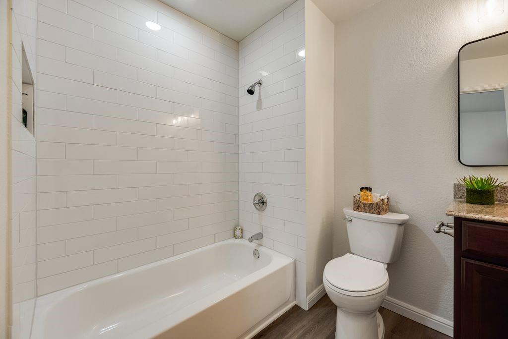 190 Merlin Way Euless, TX 76039 - Photo 27 of 39 Bathroom #2 also with 2026 new white subway tile shower surround, included in both bathrooms is a ledge for products