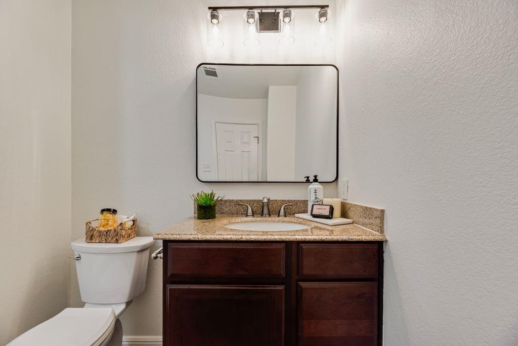 190 Merlin Way Euless, TX 76039 - Photo 29 of 39 2026 Light fixtures and mirror.