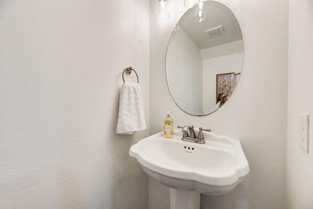 190 Merlin Way Euless, TX 76039 - Photo 34 of 39 Half bath downstairs across from kitchen