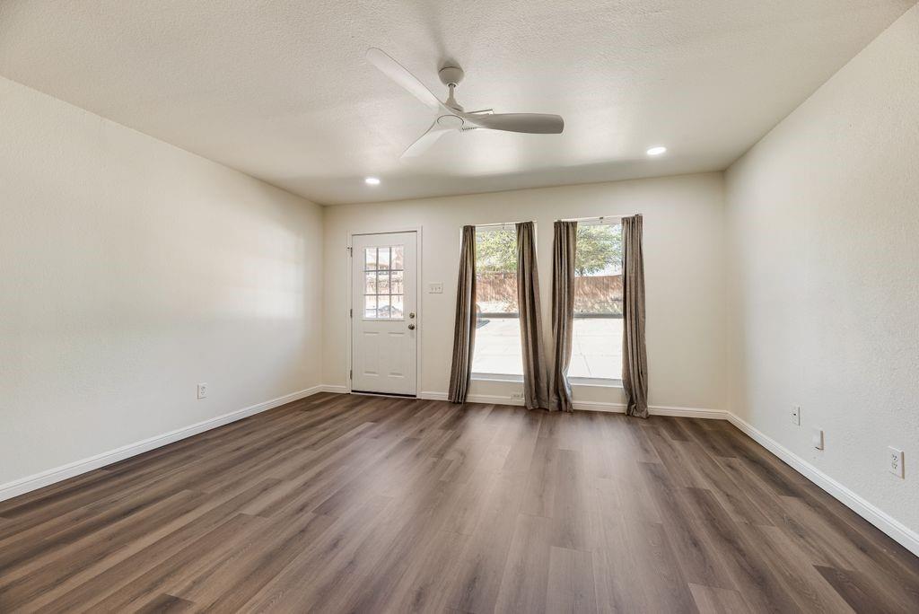 190 Merlin Way Euless, TX 76039 - Photo 35 of 39 Living room looking towards front door