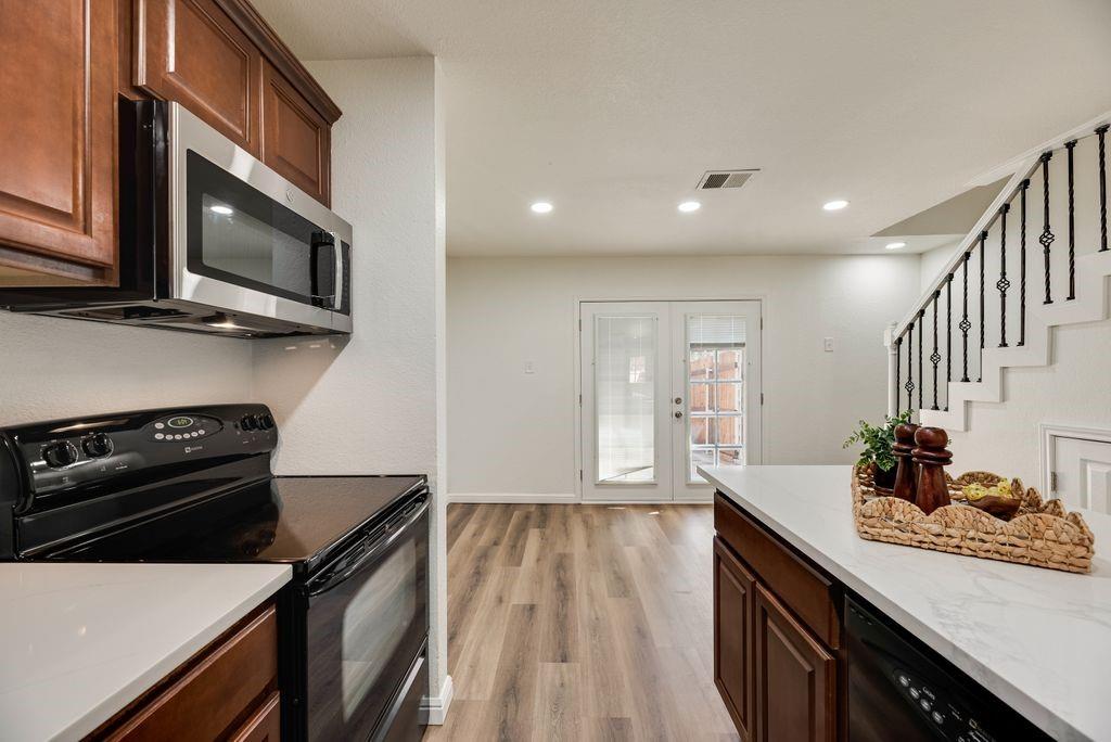 190 Merlin Way Euless, TX 76039 - Photo 8 of 39 View towards back doors