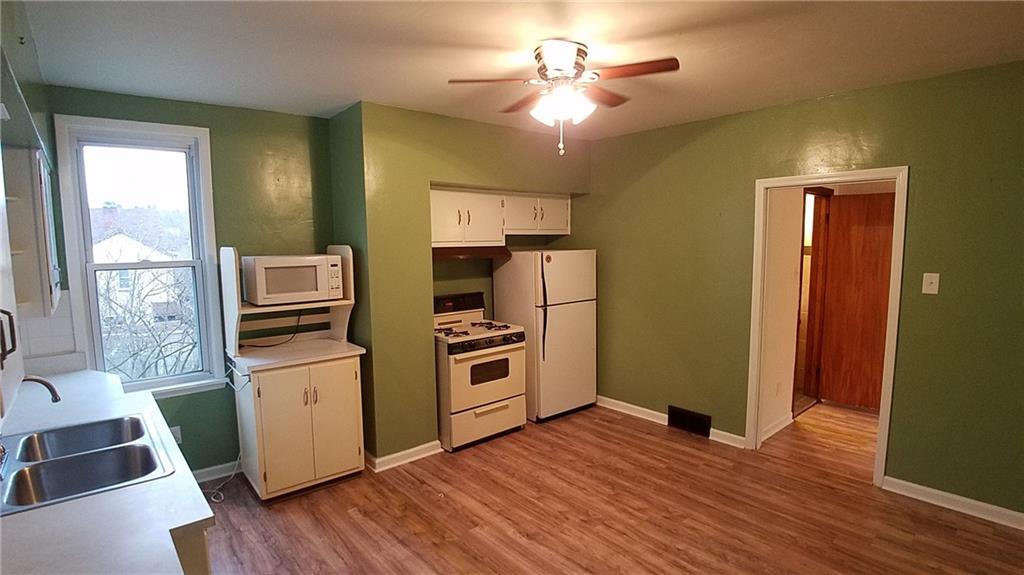 13 Spring Street Etna, PA 15223 - Photo 3 of 25 Large open Kitchen with natural light.