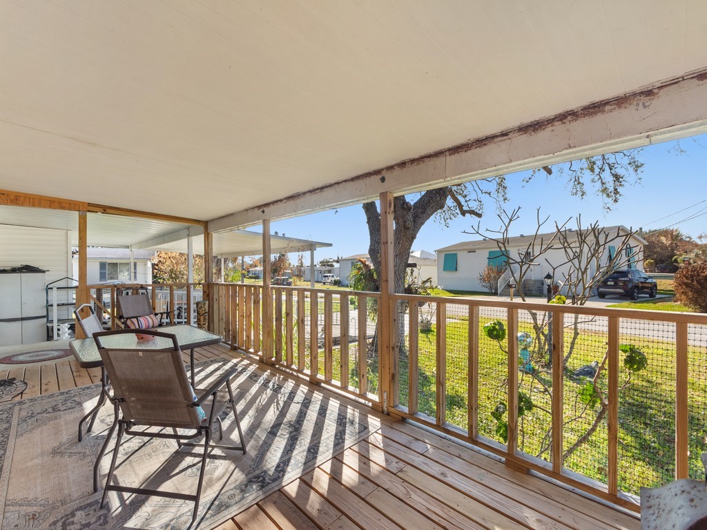 7380 129th Street Sebastian, FL 32958 - Photo 13 of 36 a view of an chairs and table in the balcony