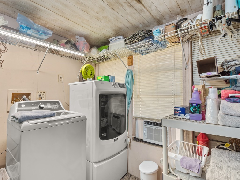 7380 129th Street Sebastian, FL 32958 - Photo 25 of 36 a utility room with dryer and washer