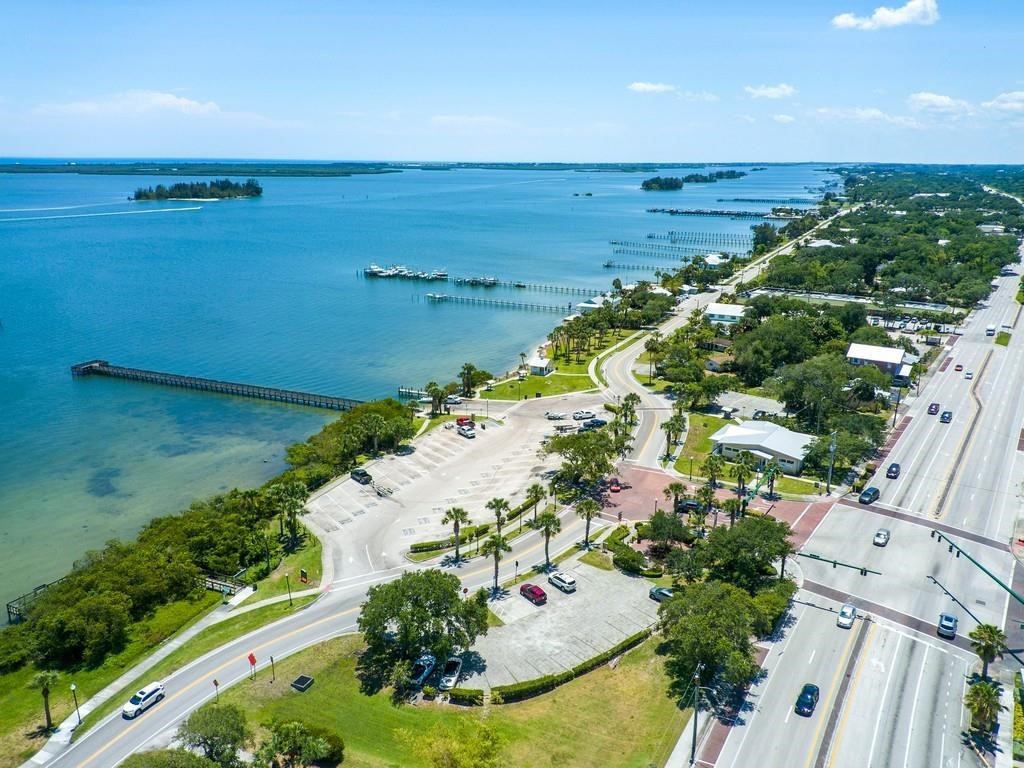 7380 129th Street Sebastian, FL 32958 - Photo 35 of 36 a view of a lake with a building in the background