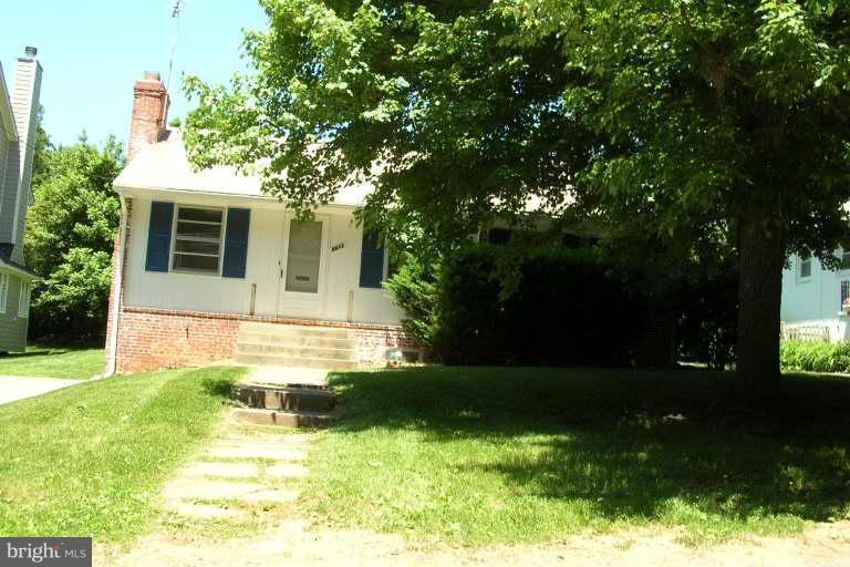 8612 Ridge Road Bethesda, MD 20817 - Photo 1 of 1 a view of a house with a yard