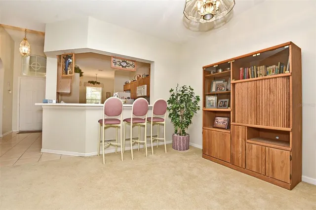 a dinning room with furniture and a table