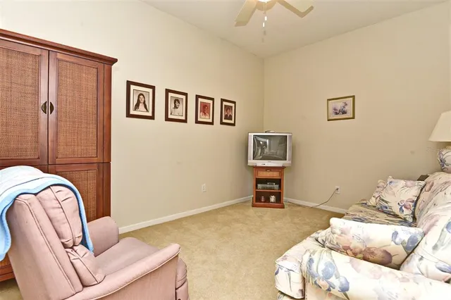 a bedroom with a bed and furniture